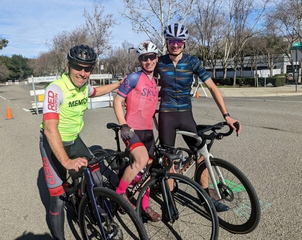 Red Peloton U23 bike racing team members Oliver and Finnian (with U23 mentor Mike Charleton on the left) at the early bird criteriums in Livermore January 2026. Both took wins in separate heats.