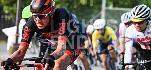 Curtis Stewart of Red Peloton racing the may 12, 2026 TNT criterium bike race in Santa Rosa, Northern California.