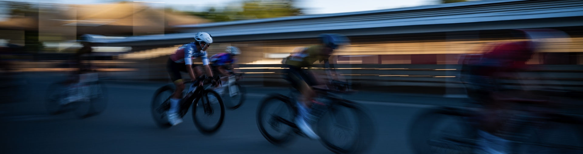 TNT bike race photo from the July 7, 2026 TNT criterium series in Santa Rosa, North Bay Area, California. Blurred bike racers on the course.
